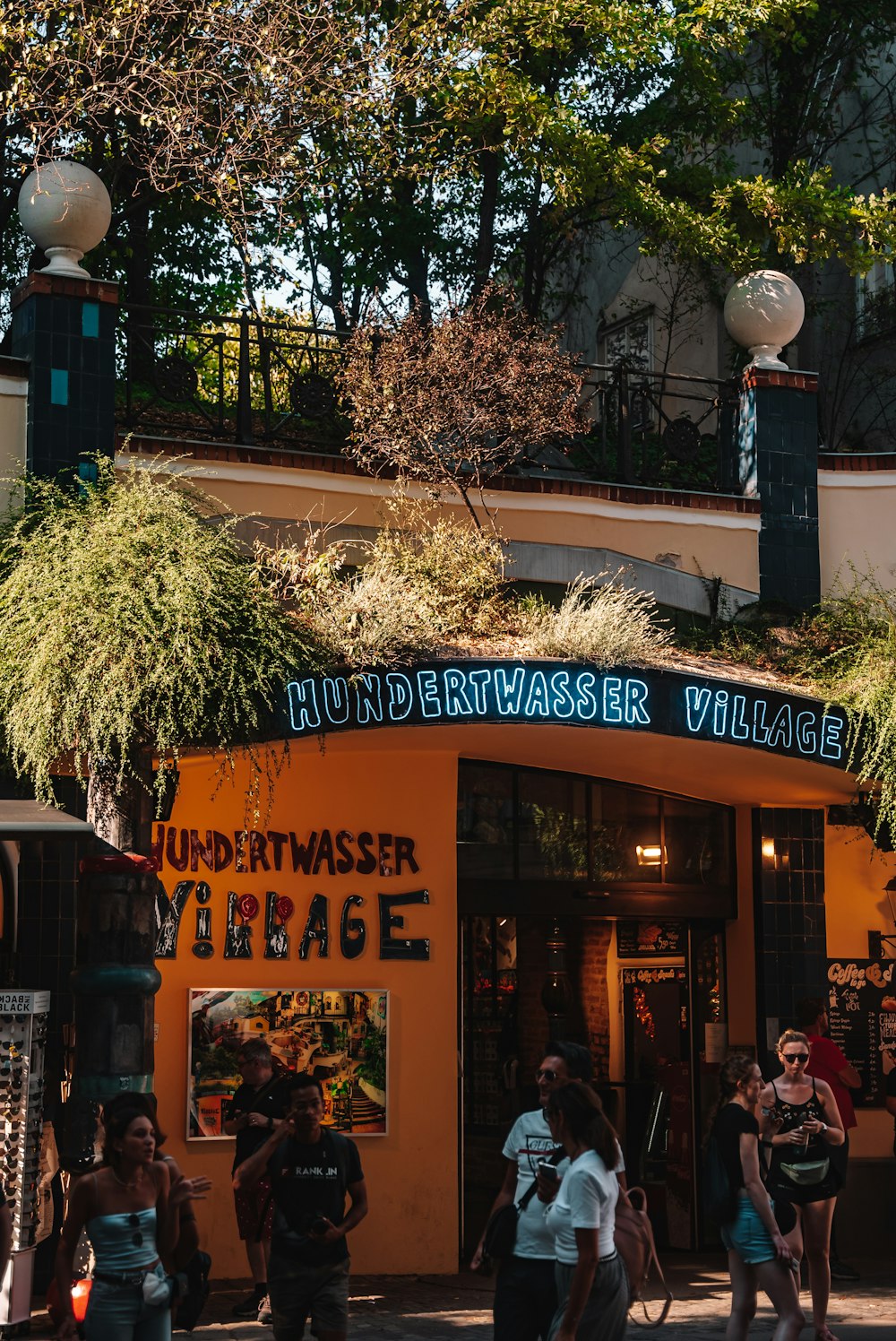 a group of people standing outside of a building