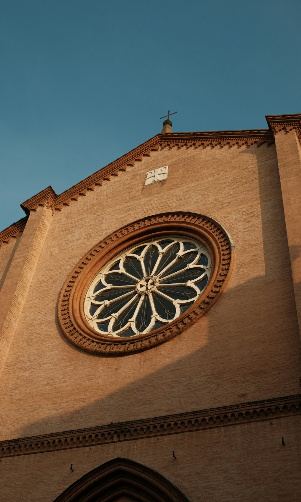 a church steeple with a stained glass window