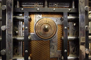 a close up of a metal door with a lock