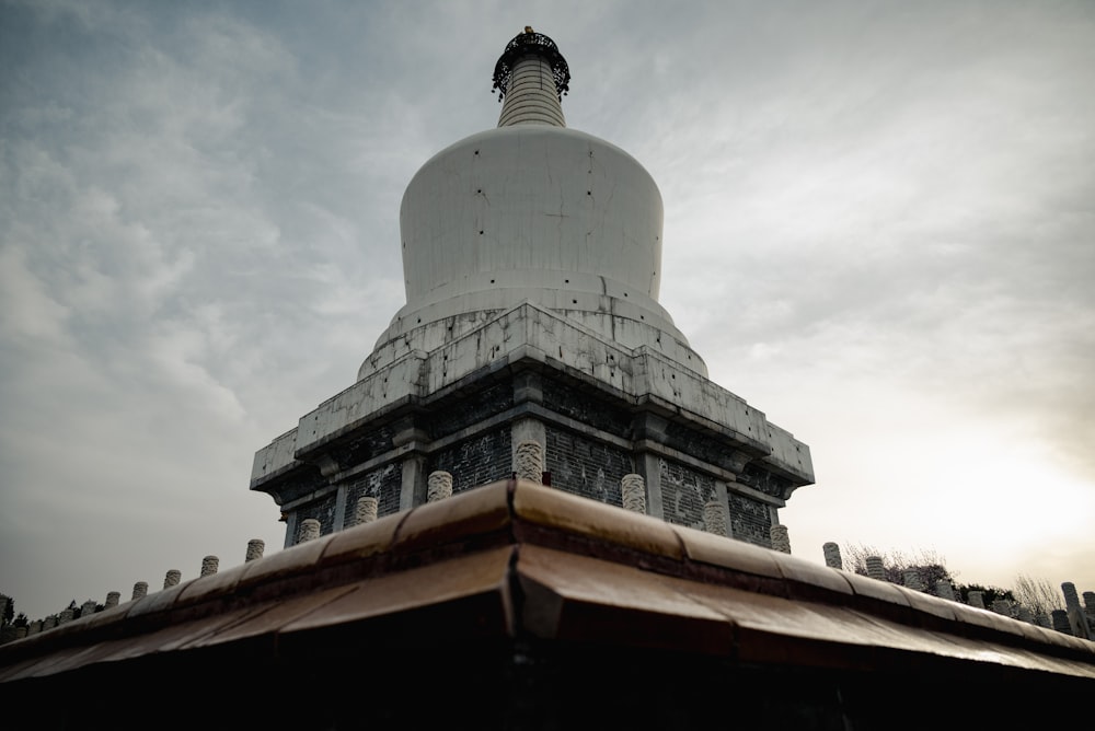 a large white dome with a sky background