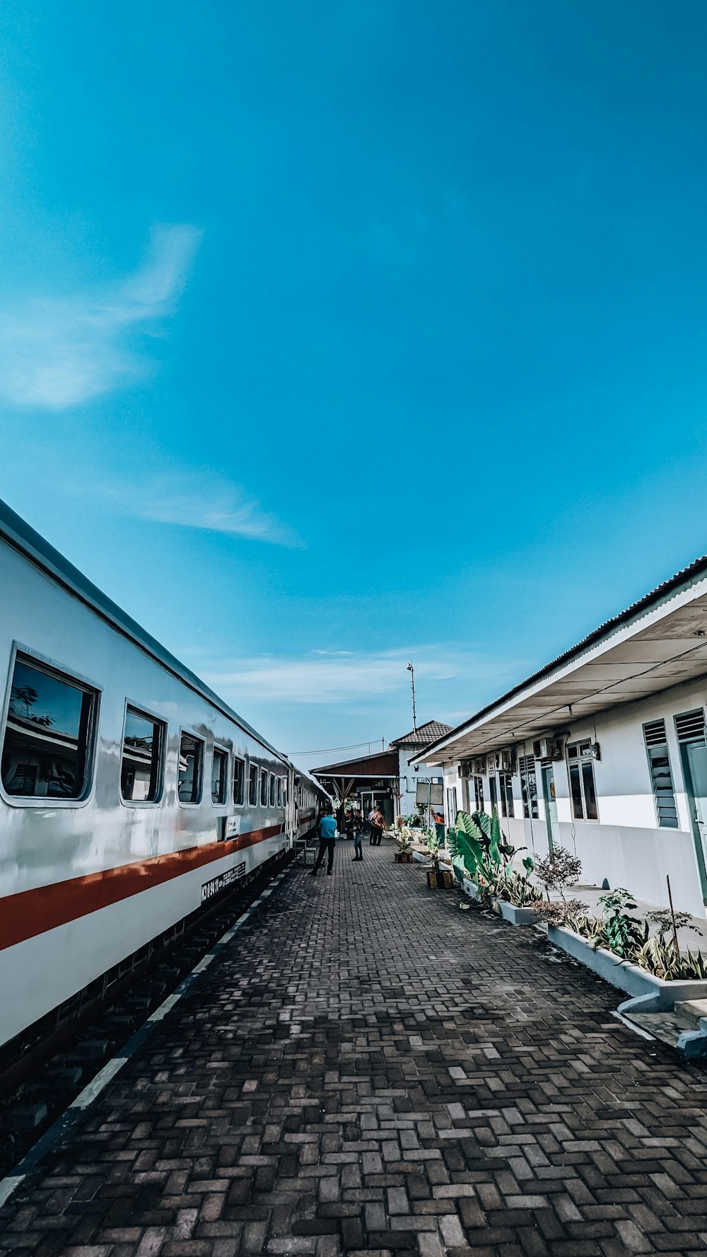 a couple of trains parked next to each other