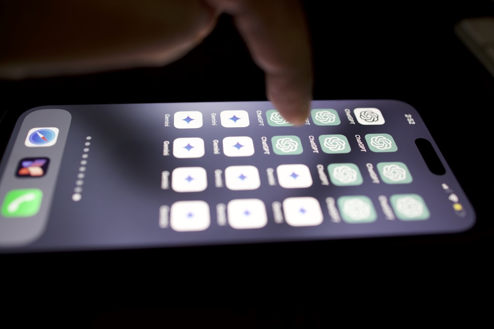 a close up of a person touching a cell phone