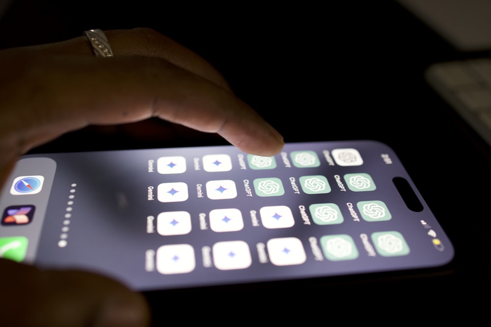 a close up of a person touching a cell phone