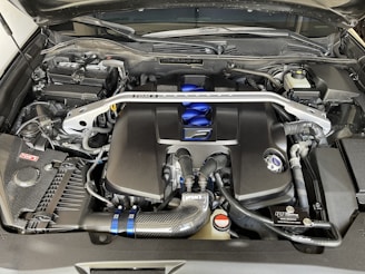 the engine compartment of a car with its hood open