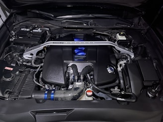 the engine compartment of a car with its hood open