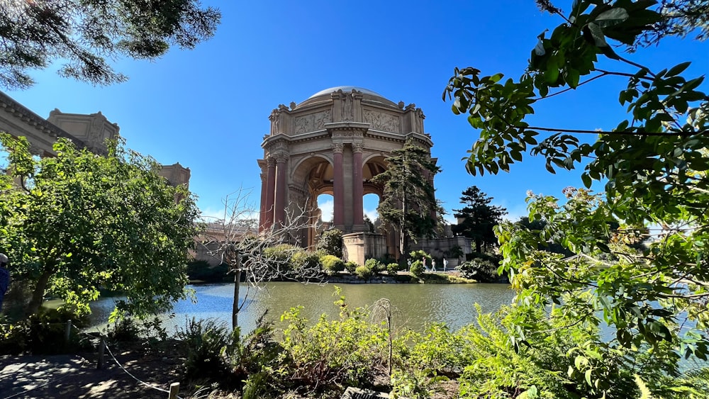 a view of the palace of fine arts from across the pond