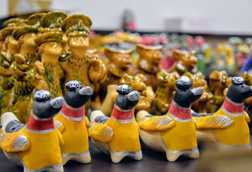a group of toy animals sitting on top of a table