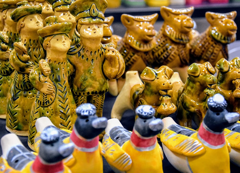 a group of ceramic bears sitting next to each other