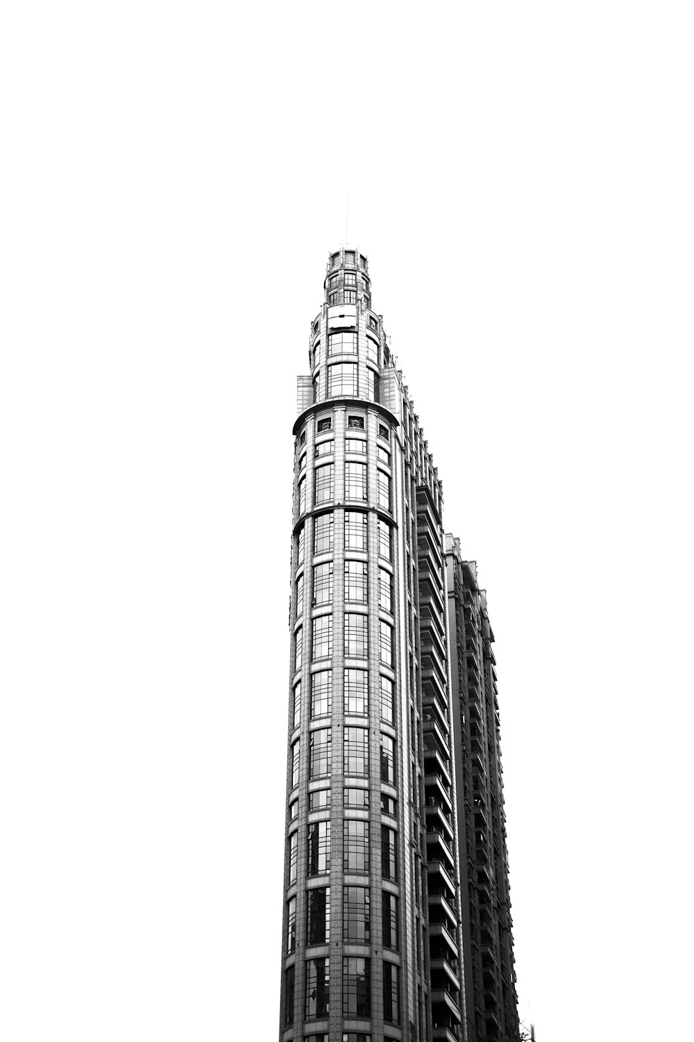 a black and white photo of a tall building