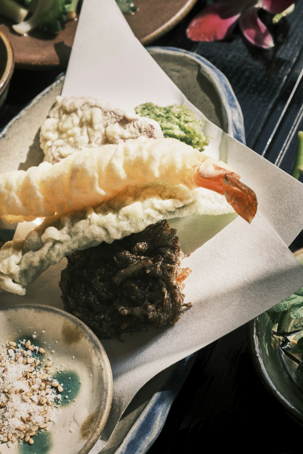 a plate of food on a wooden table