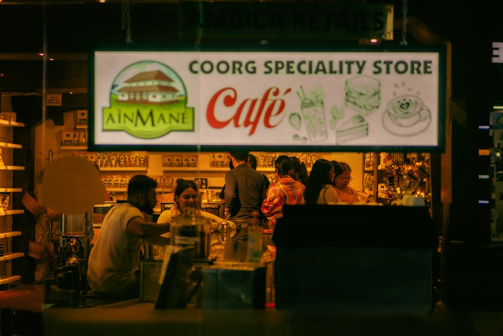 a group of people standing in front of a store