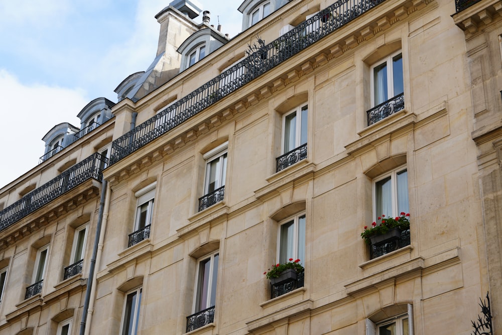 a tall building with a clock on the top of it