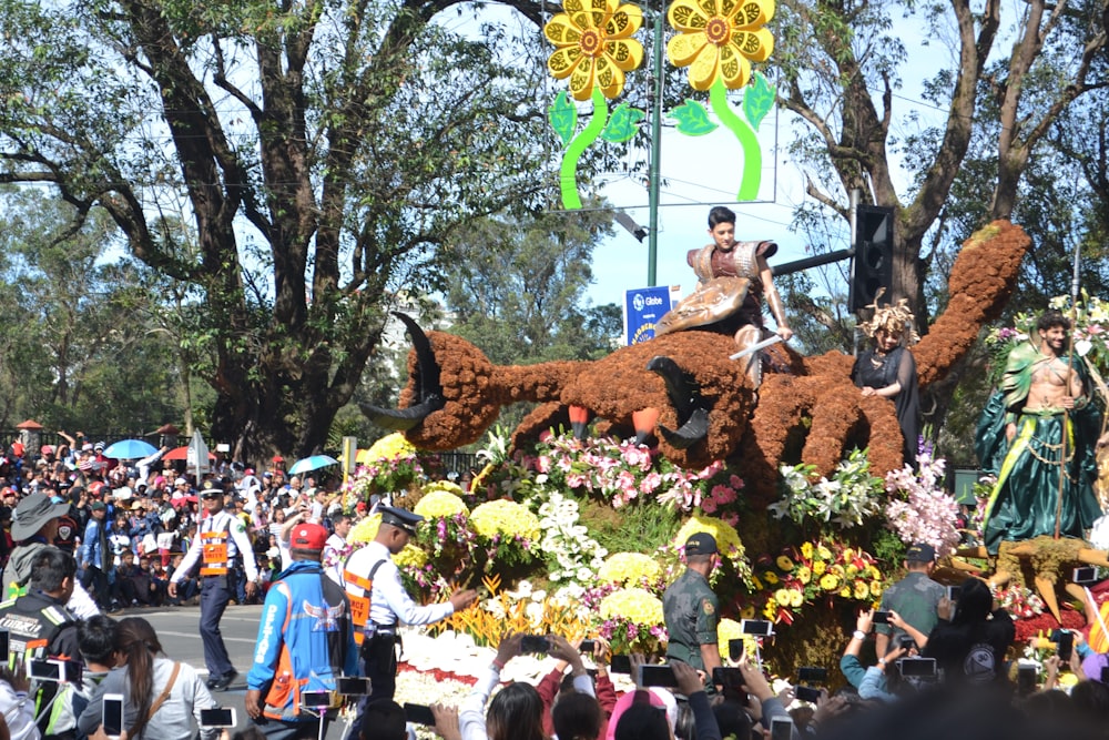 a group of people riding on the back of a float