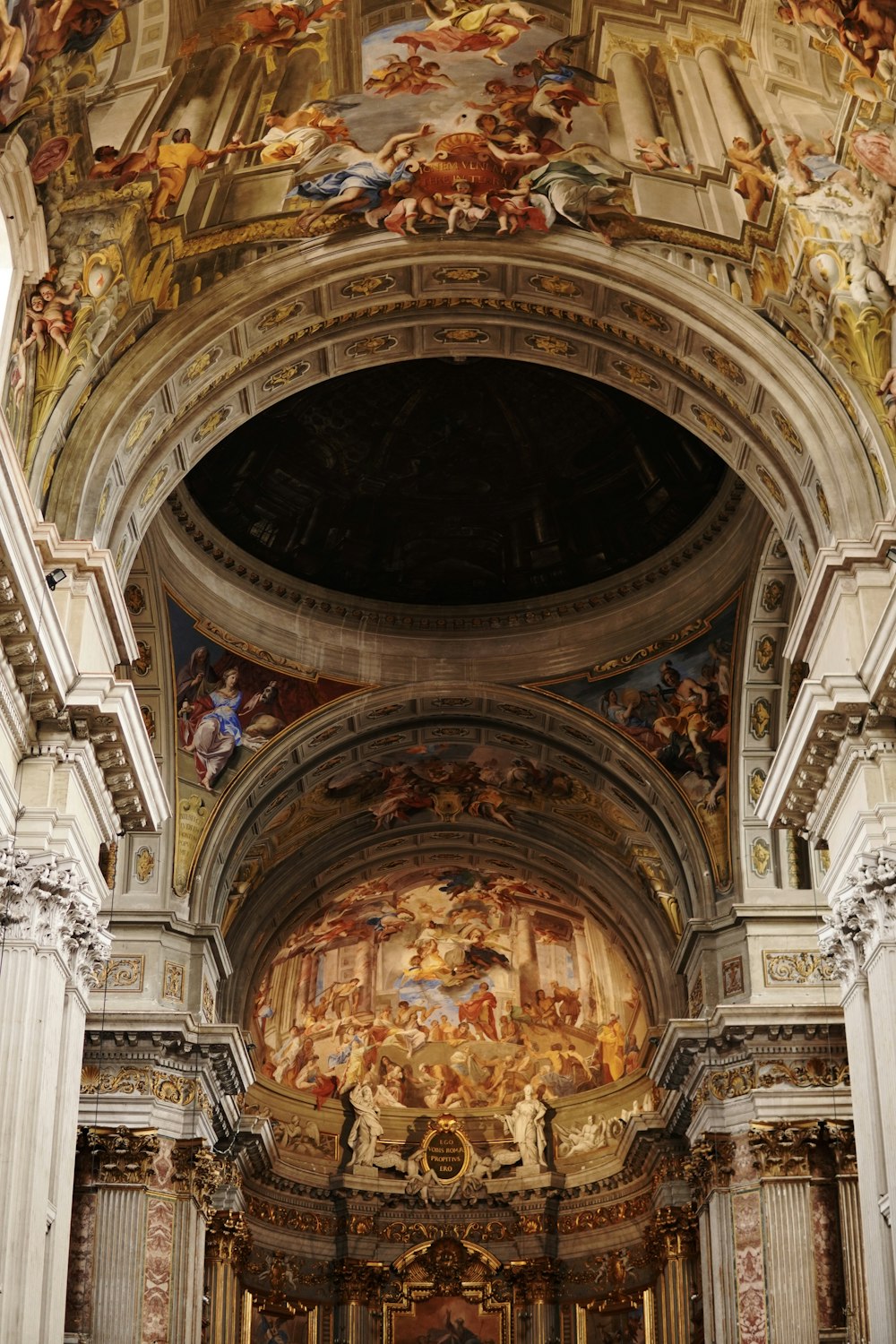 a church with a painting on the ceiling
