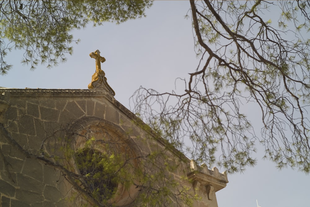 a building with a cross on top of it