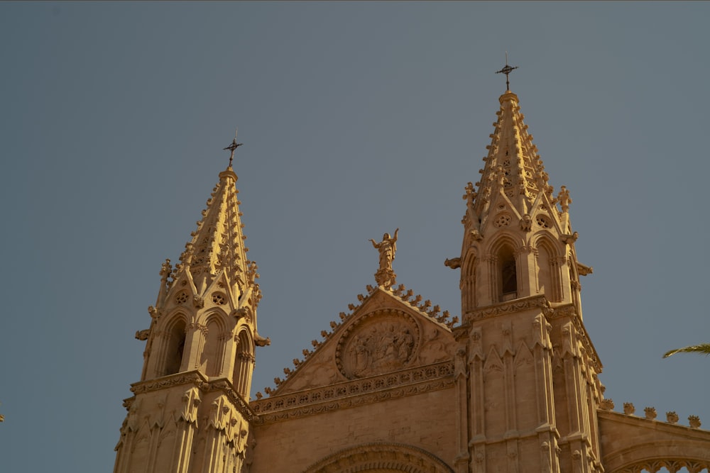 a large cathedral with a clock on it's side