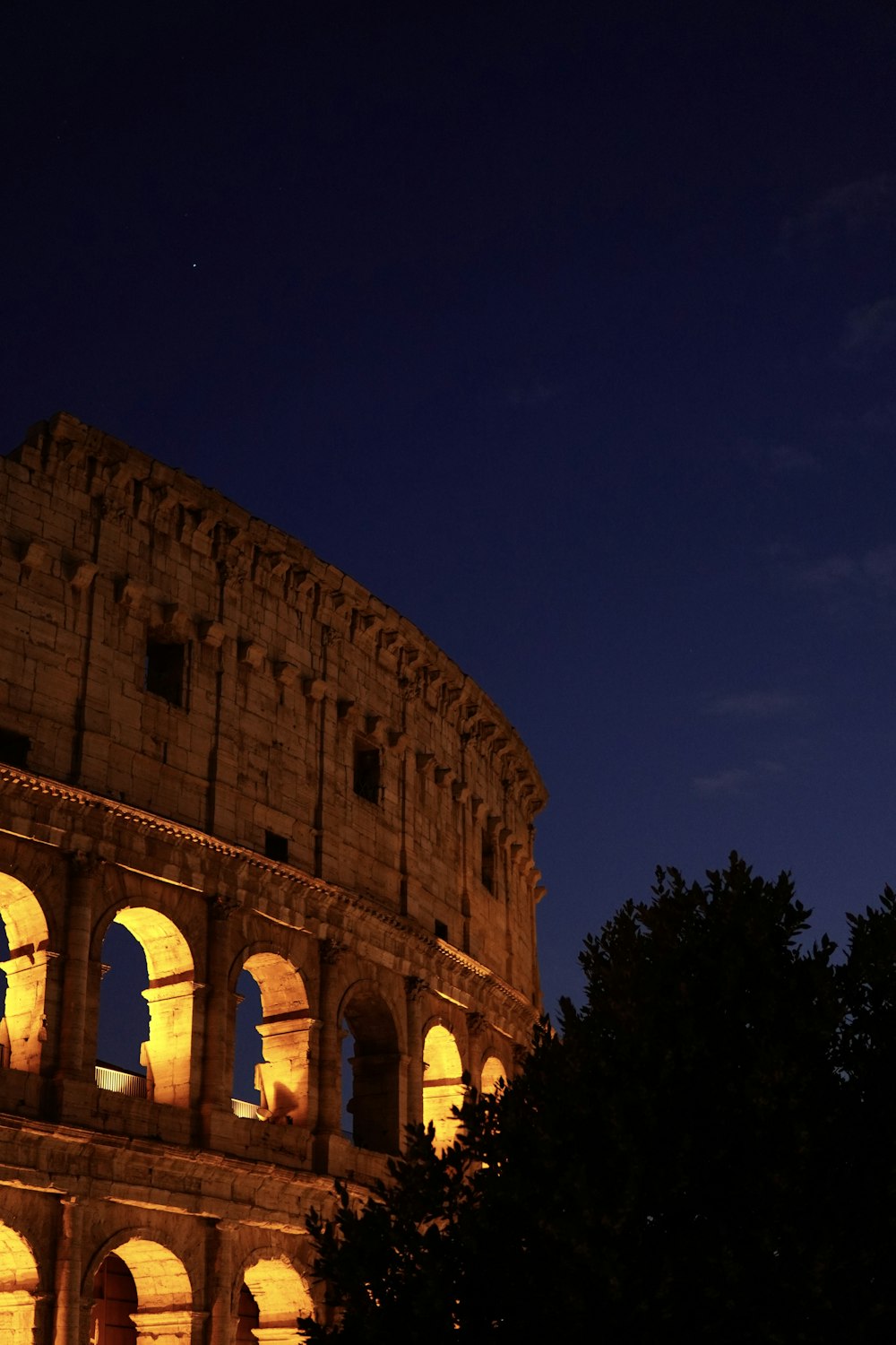 a night view of the colossion in rome