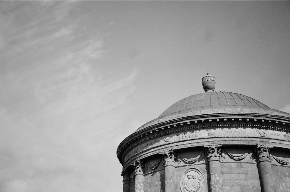 a black and white photo of a dome on a building