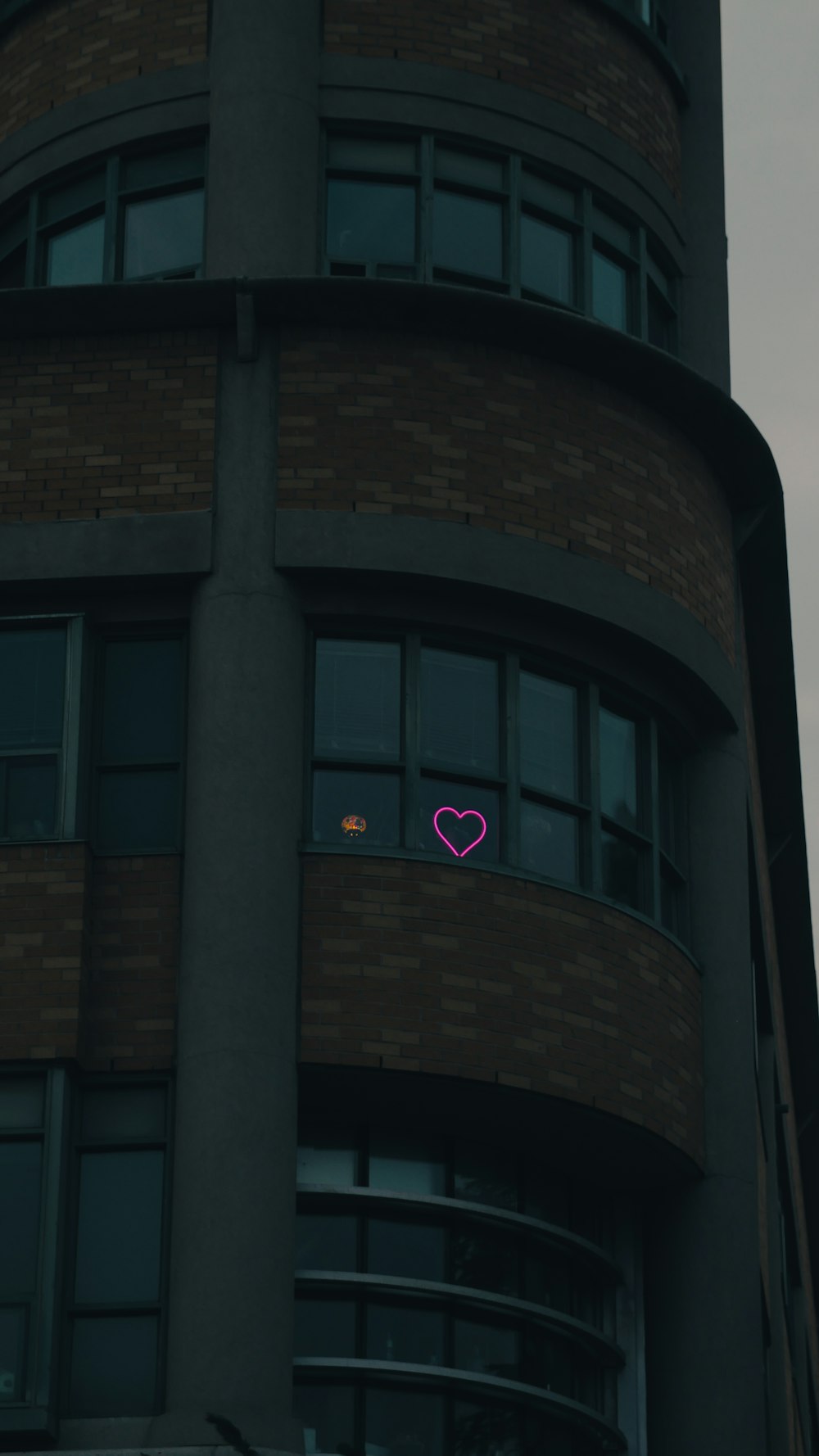 a building with a heart drawn on the side of it