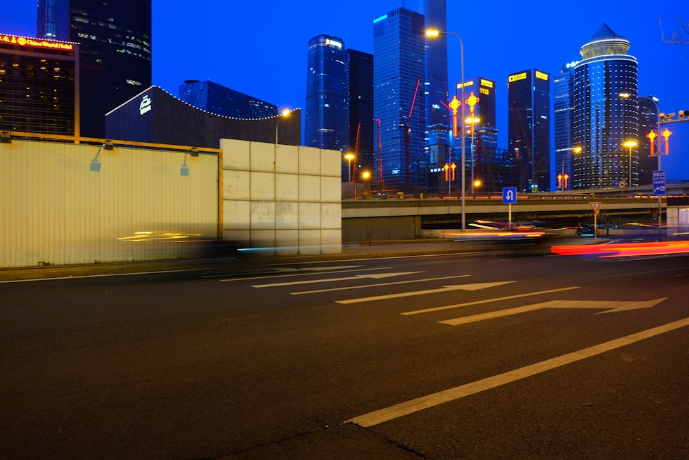 a city street with a lot of tall buildings