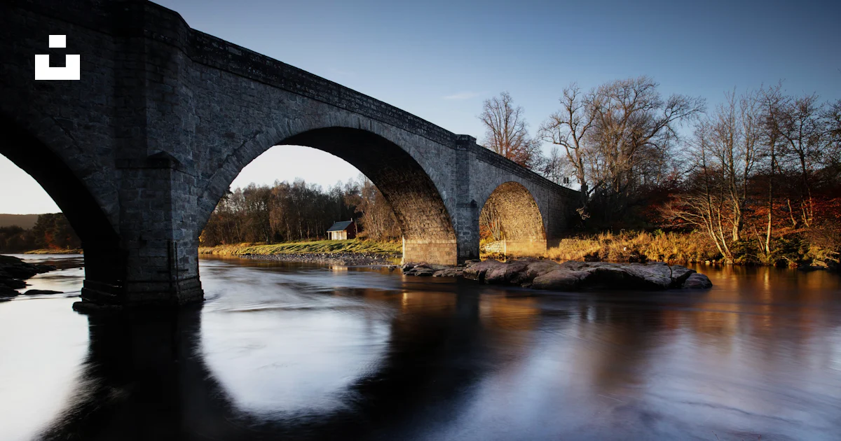 Pottarch An old stone bridge over a river in the fall photo – Free Potarch ...