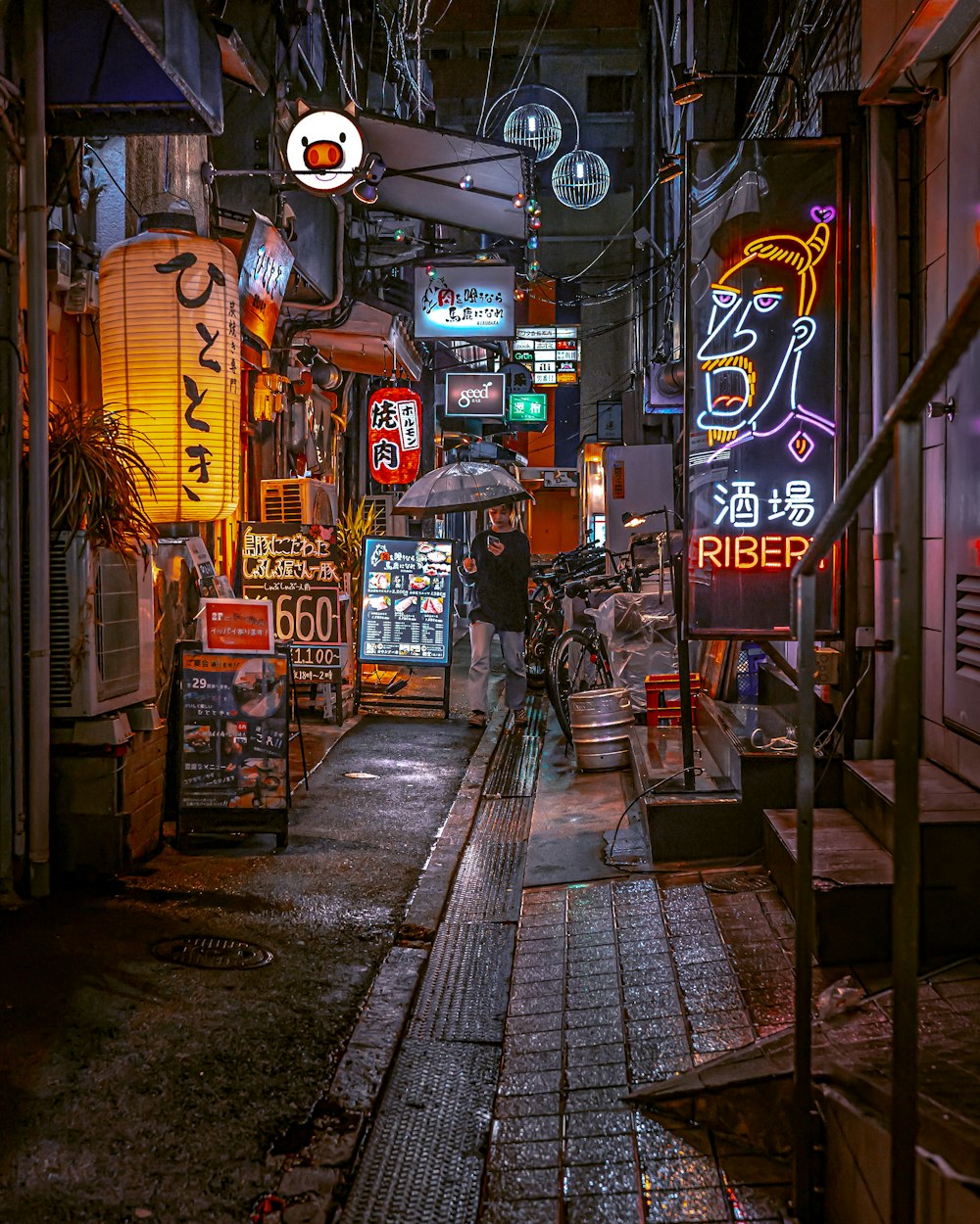 a person walking down a street with an umbrella