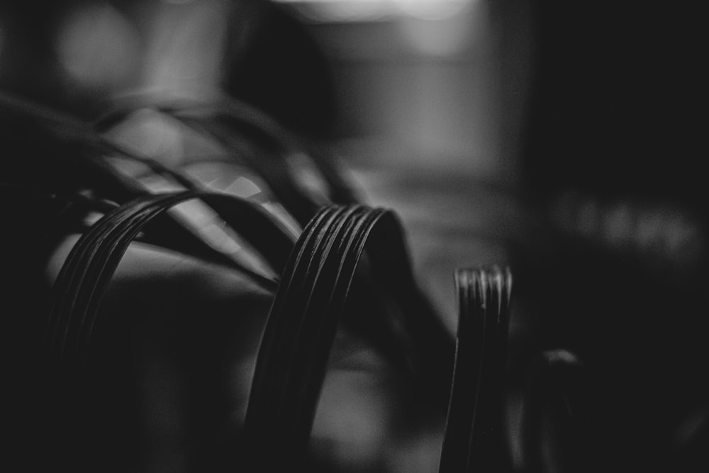 a black and white photo of a row of chairs