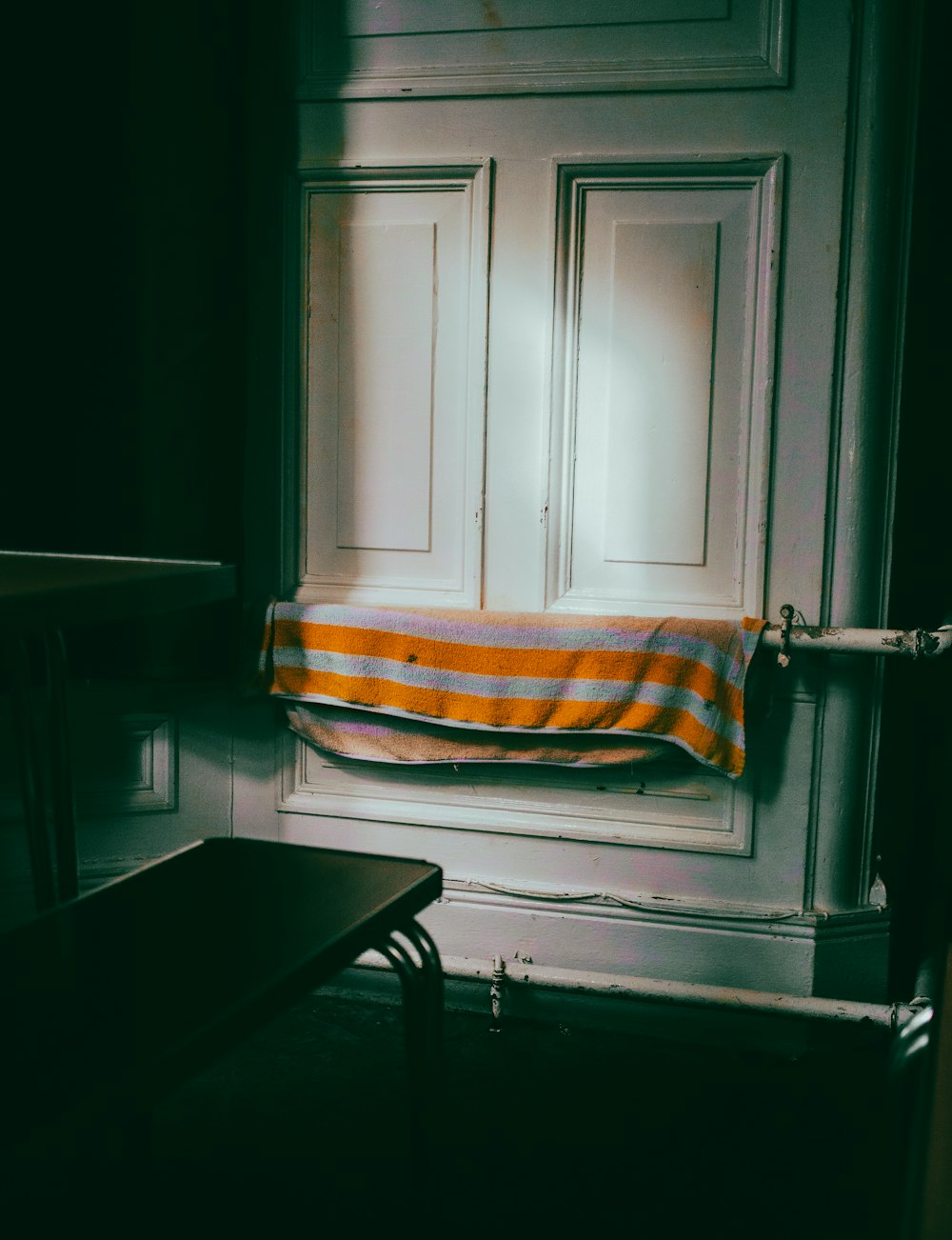 a towel is hanging on the door of a room