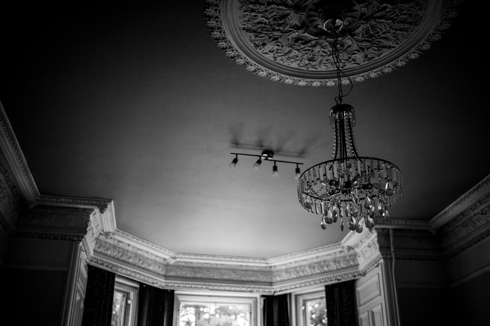 a chandelier hanging from the ceiling of a room