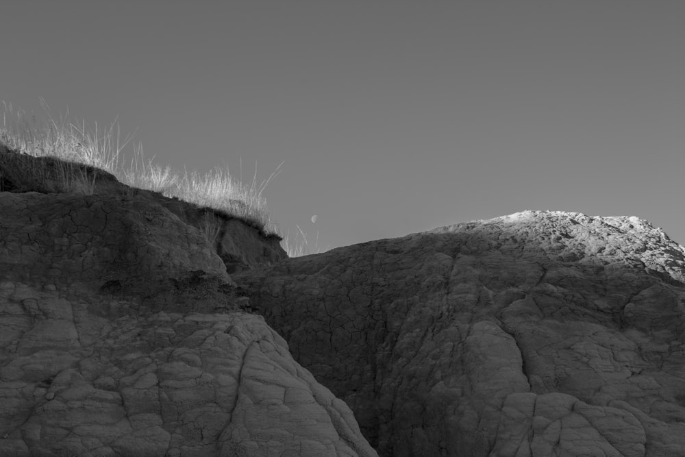 a black and white photo of a mountain