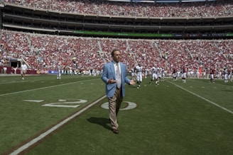 Nick Saban, who is the Alabama team coach, gives interviews and watches all the plays during this important spring scrimmage at University of Alabama, Tuscaloosa, Alabama