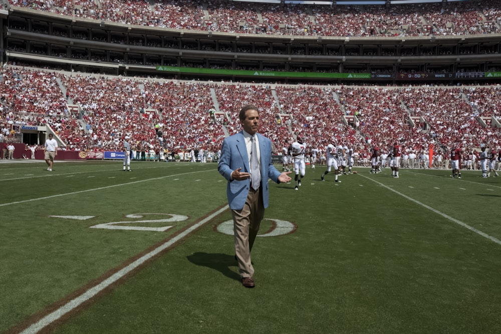 Nick Saban, who is the Alabama team coach, gives interviews and watches all the plays during this important spring scrimmage at University of Alabama, Tuscaloosa, Alabama