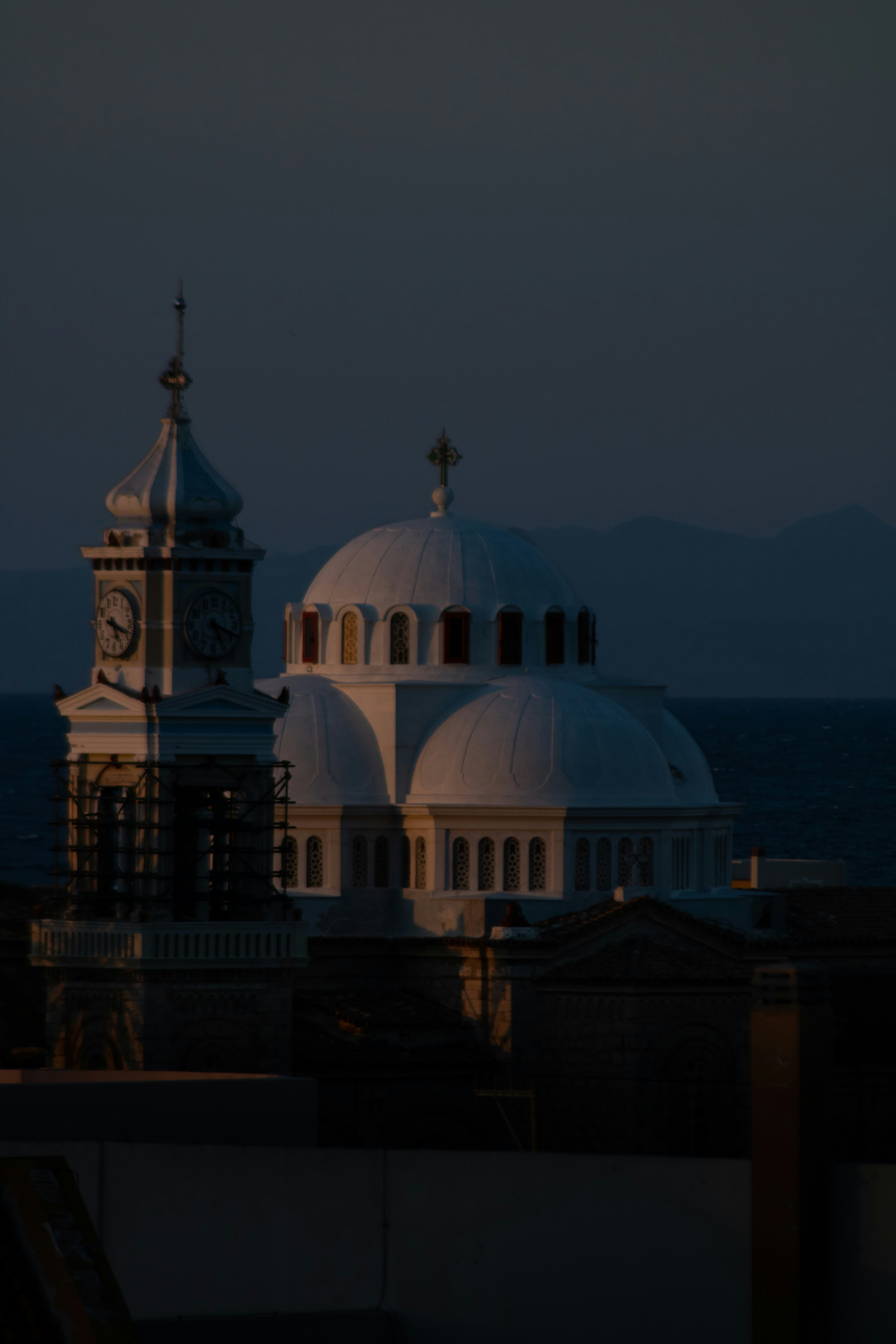 a large building with a clock on the top of it