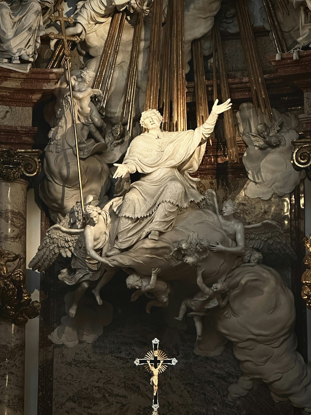 a statue of jesus on a horse in a church