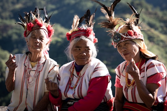 three native american women posing for a picture