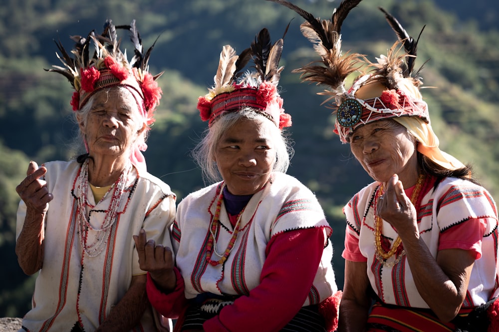 three native american women posing for a picture