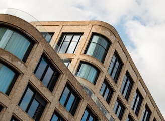 a tall building with lots of windows on top of it