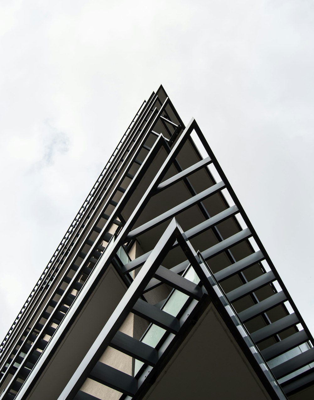 a very tall building with a metal roof