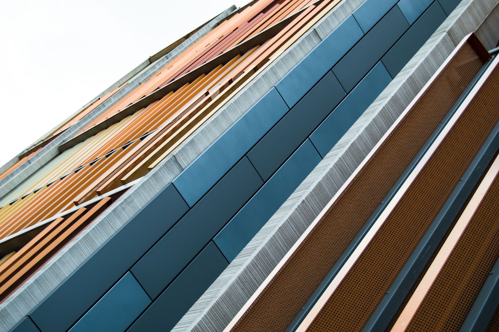 a close up of a tall building with a sky background