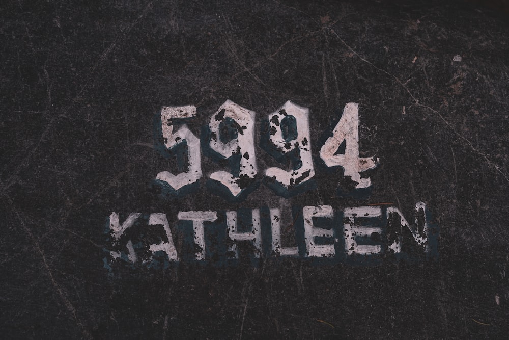 a black and white photo with the words kohleen painted on it