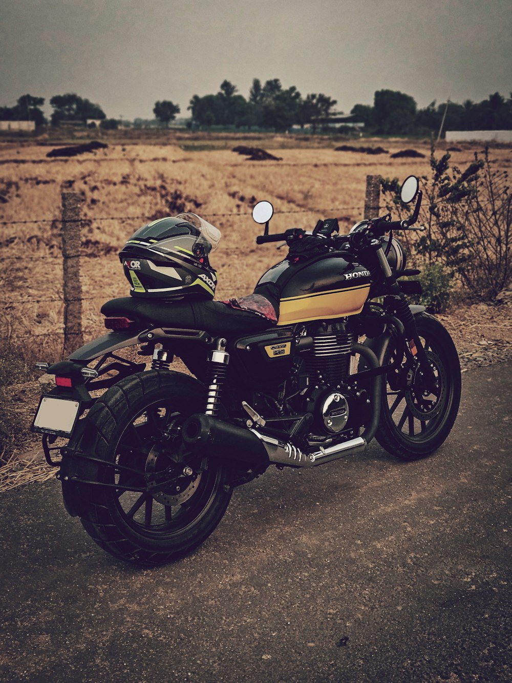 a motorcycle parked on the side of the road