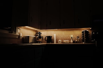 a kitchen with a microwave, coffee maker and other appliances