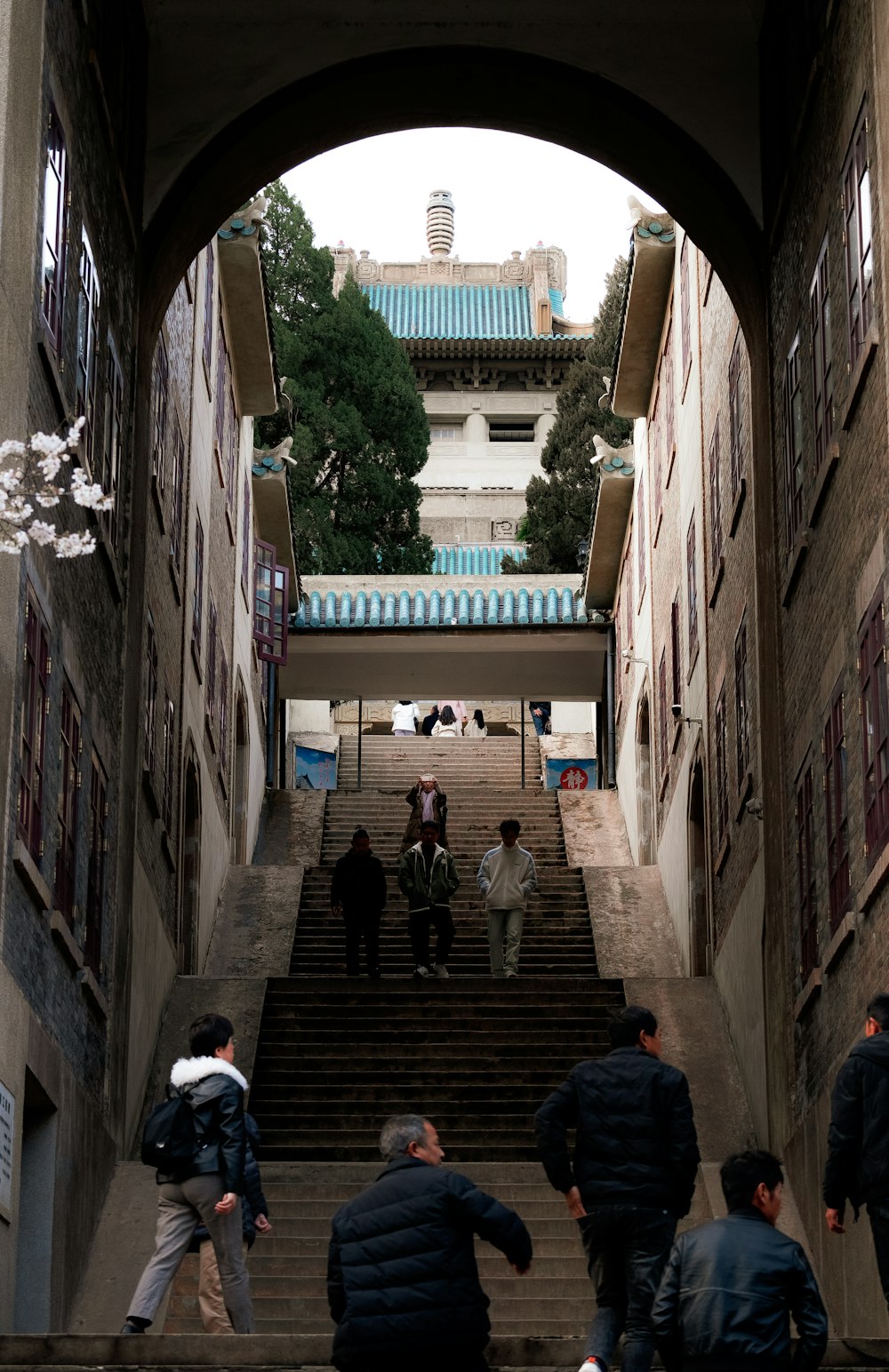 a group of people walking down a flight of stairs