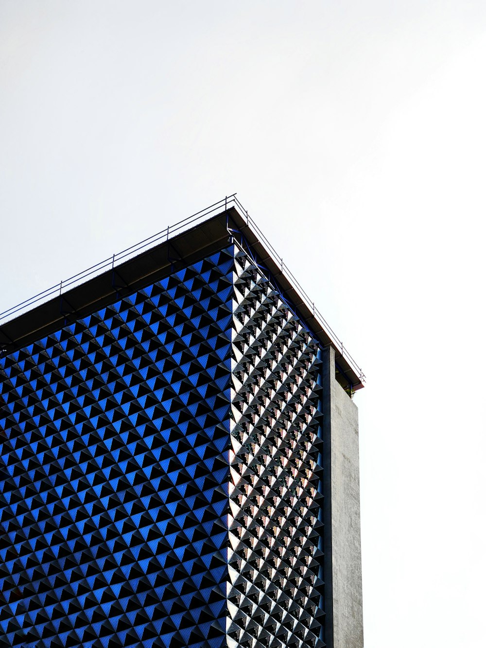 a tall building with a clock on the top of it