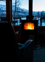 a fire burning in a fireplace in a living room