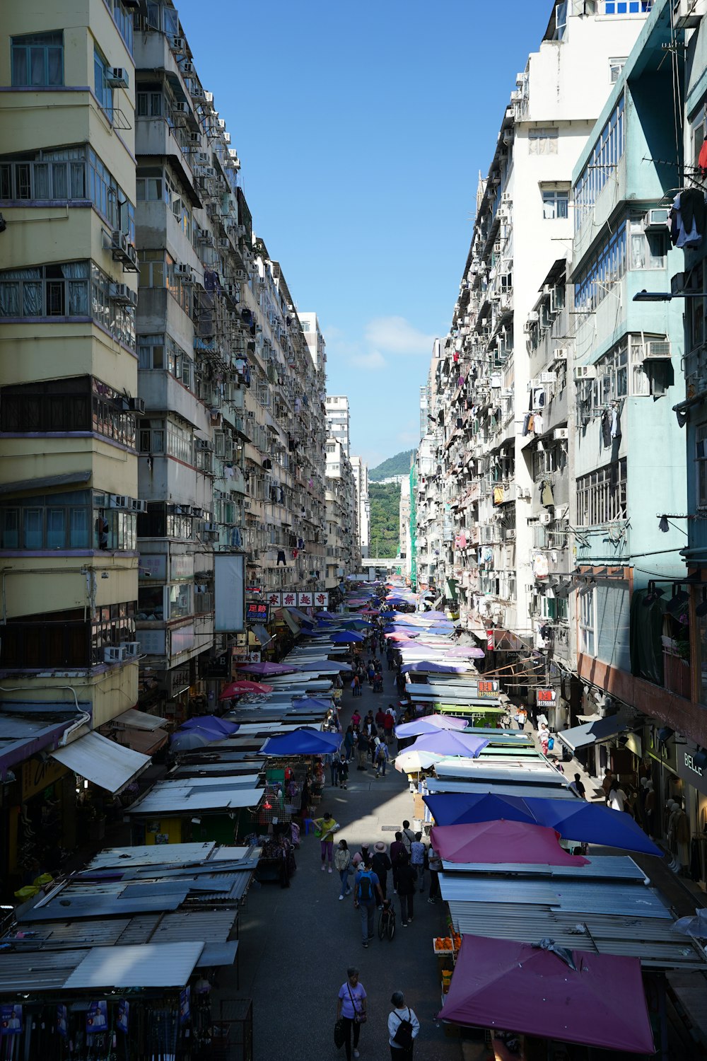 a city street filled with lots of tall buildings