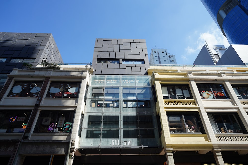 a group of buildings with a sky background