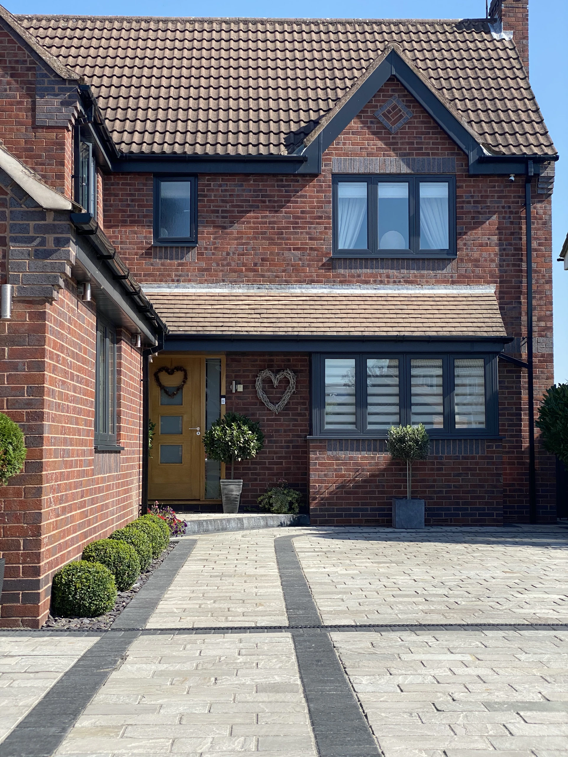 British new-build house with block-paved driveway