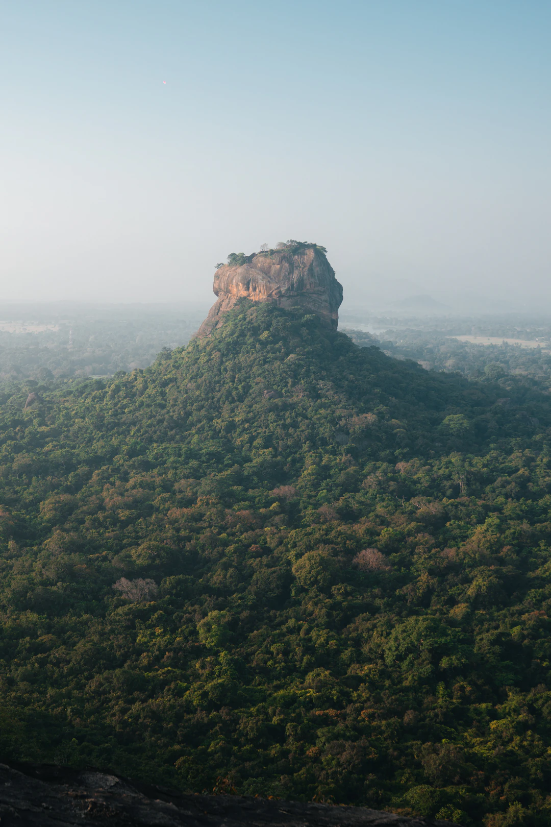 Sigiriya rising above the green landscape of Sri Lanka