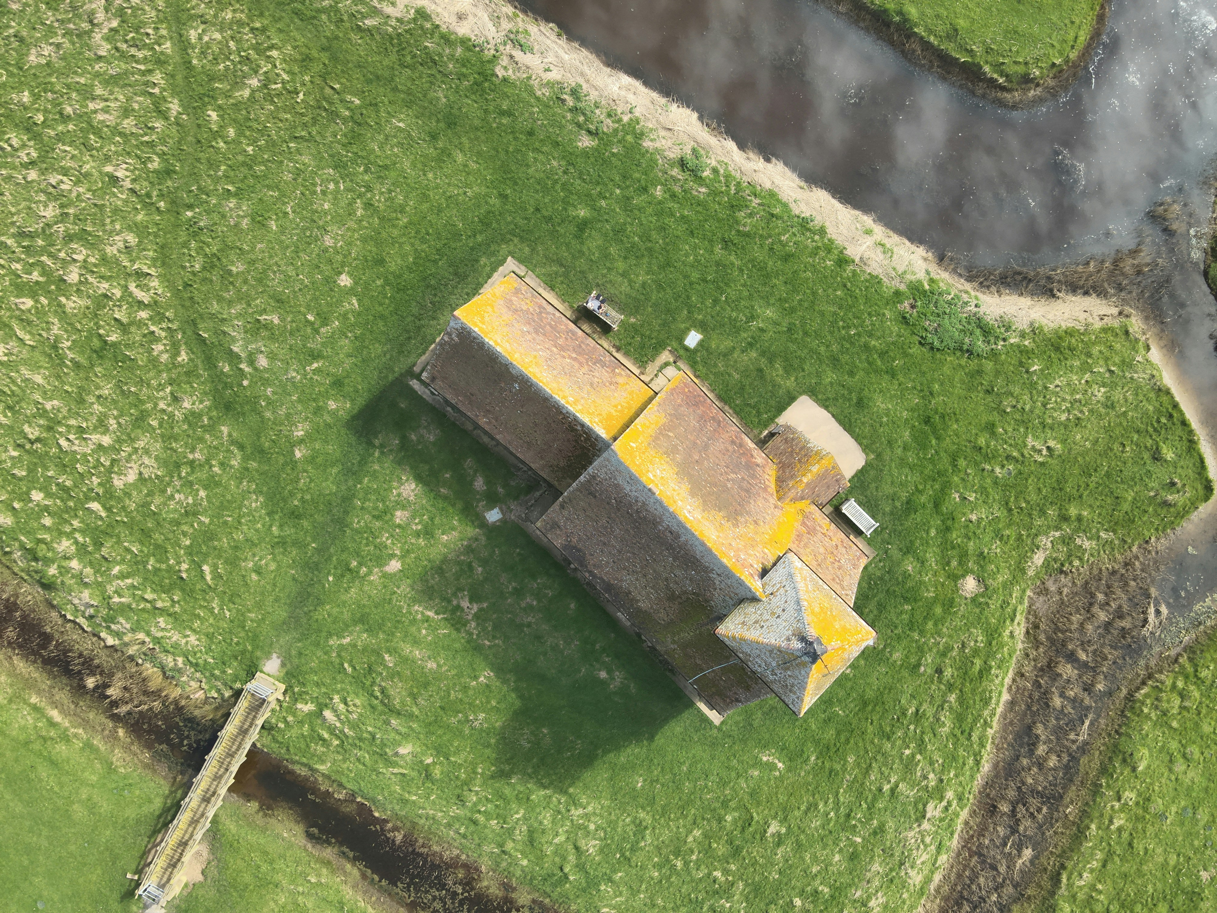 a crisp, detailed aerial photo of a house highlighting its large yard - dji mavic air 2 real estate photography